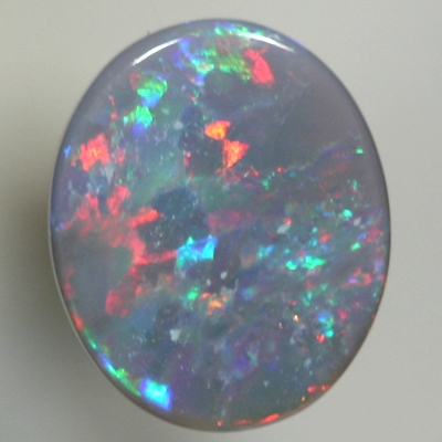 SOLID SEMI BLACK OPAL Red sparkles amongst green